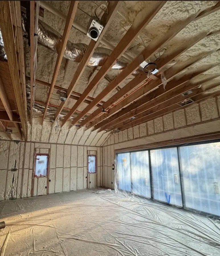Interior walls and ceiling insulated with spray foam during new construction in Baraboo